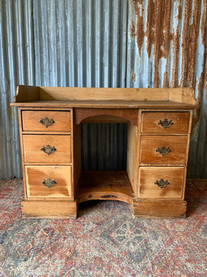 A pine clerk's desk with galleried top