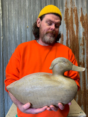 A wooden duck decoy