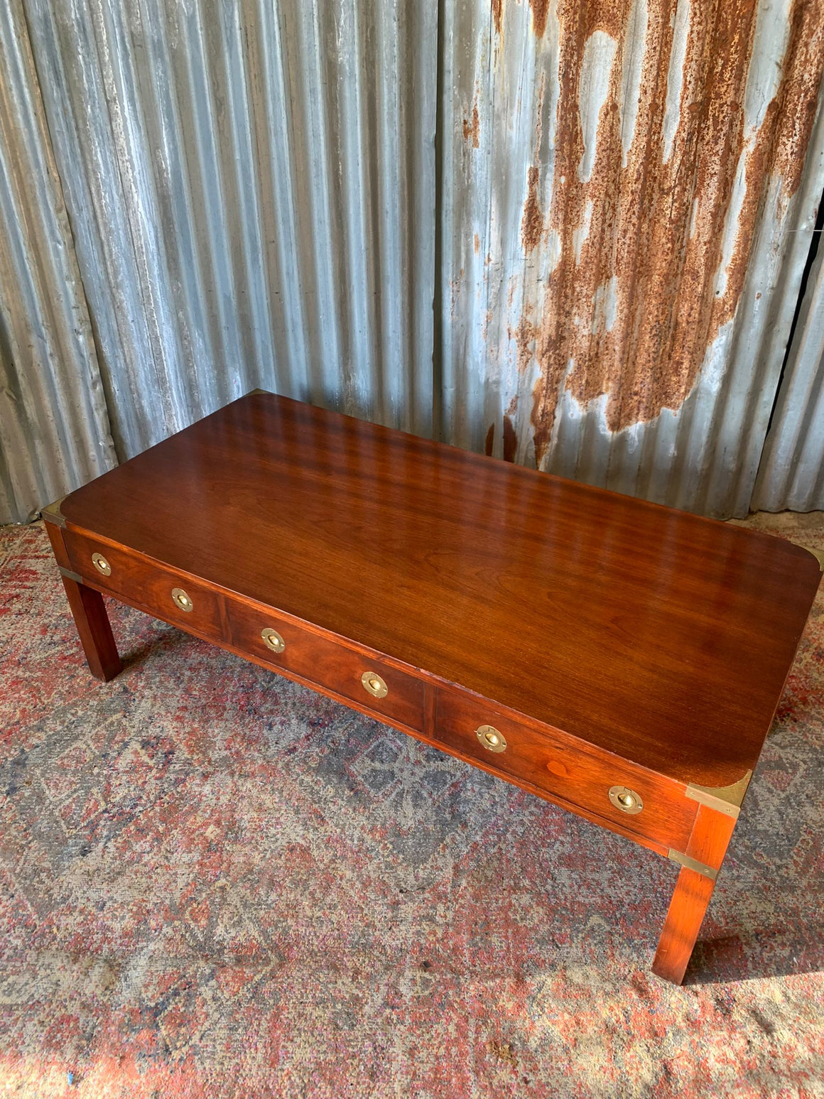 A campaign style coffee table