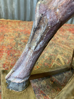 Carved wooden rocking horse