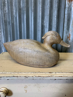 A wooden duck decoy
