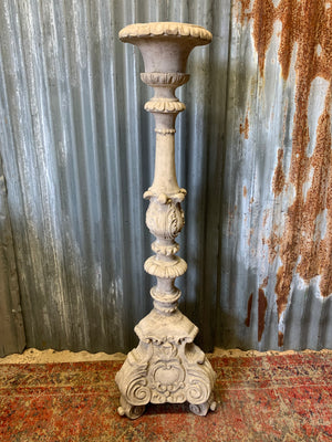 A large stone effect pricket candlestick