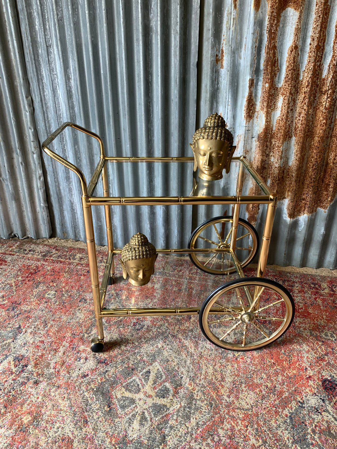 A faux bamboo Hollywood Regency two tier trolley