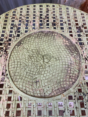 A lattice design garden table and chairs set