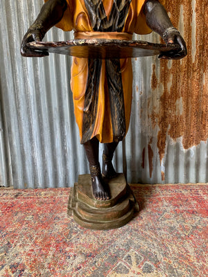 A full size Blackamoor figure with tray