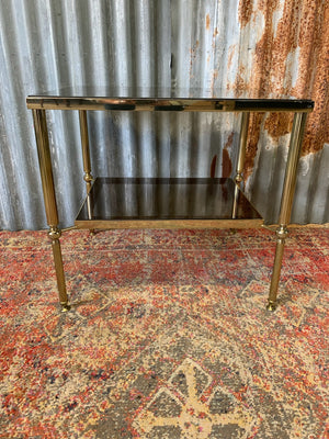 A Hollywood Regency two tier side table