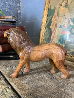 A large brown leather lion