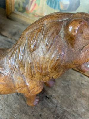 A large brown leather lion