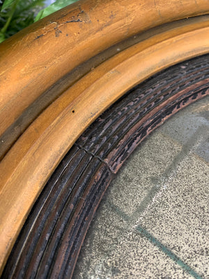 A large Regency giltwood convex mirror