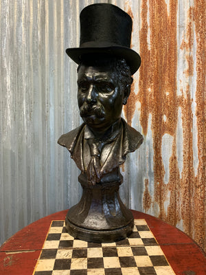 A life size terracotta bust of a gentleman - bronze finish