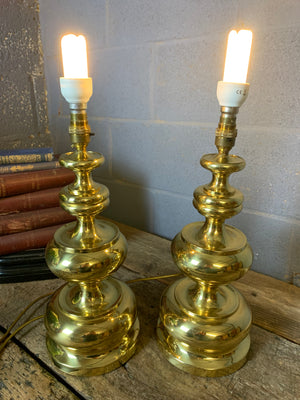 A pair of baluster form brass lamps