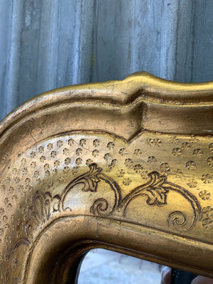 A large giltwood wall mirror