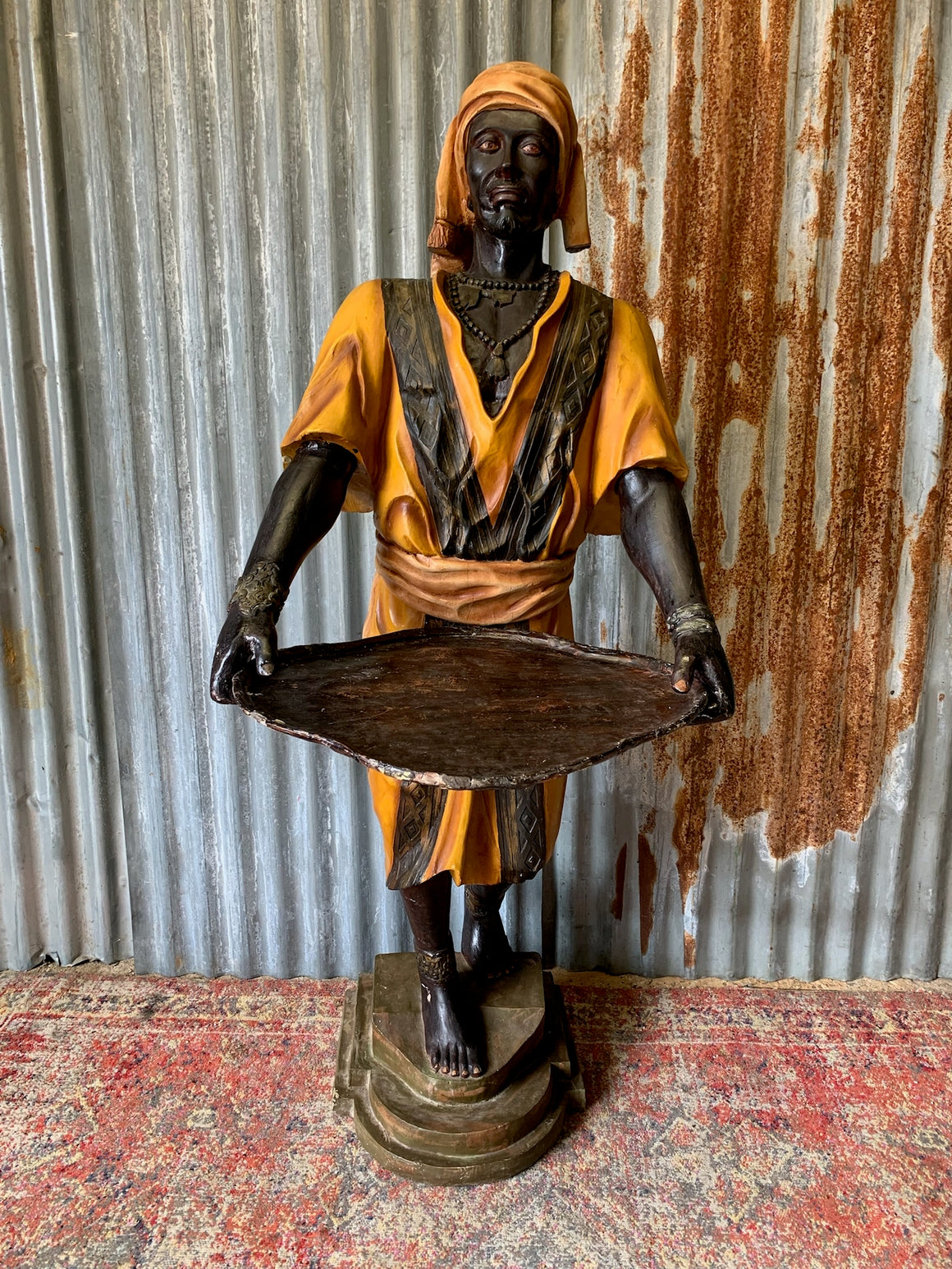 A full size Blackamoor figure with tray