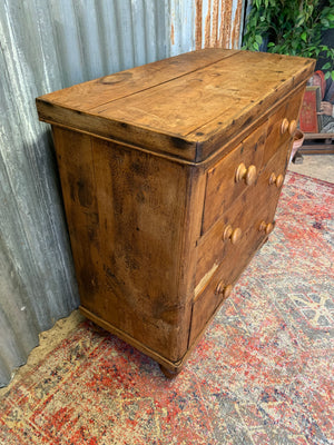 A pine chest of two over two drawers