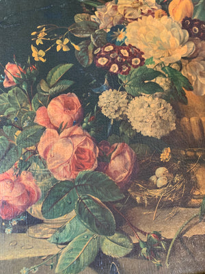 A framed floral oleograph