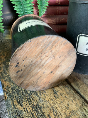 A set of three lidded wooden apothecary jars