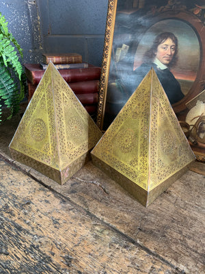 A pair of brass Moroccan wall sconces