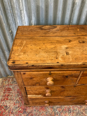 A pine chest of two over two drawers