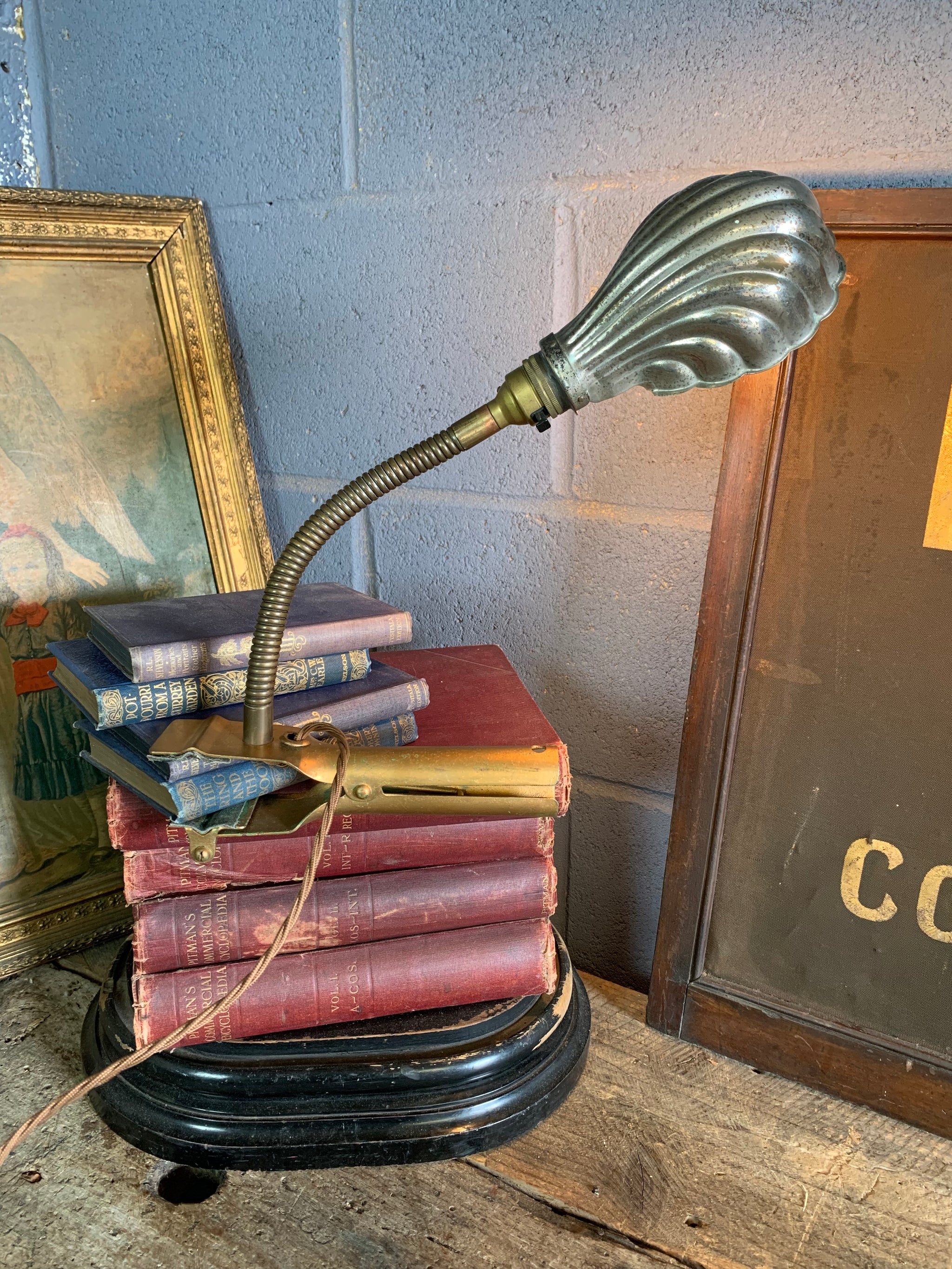 An Art Deco brass clip-on swan neck lamp Belle and Beast Emporium