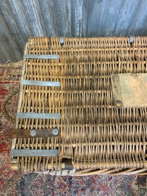 A Victorian wicker laundry basket on castors ~ B