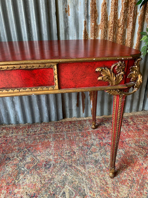 A red lacquer continental table