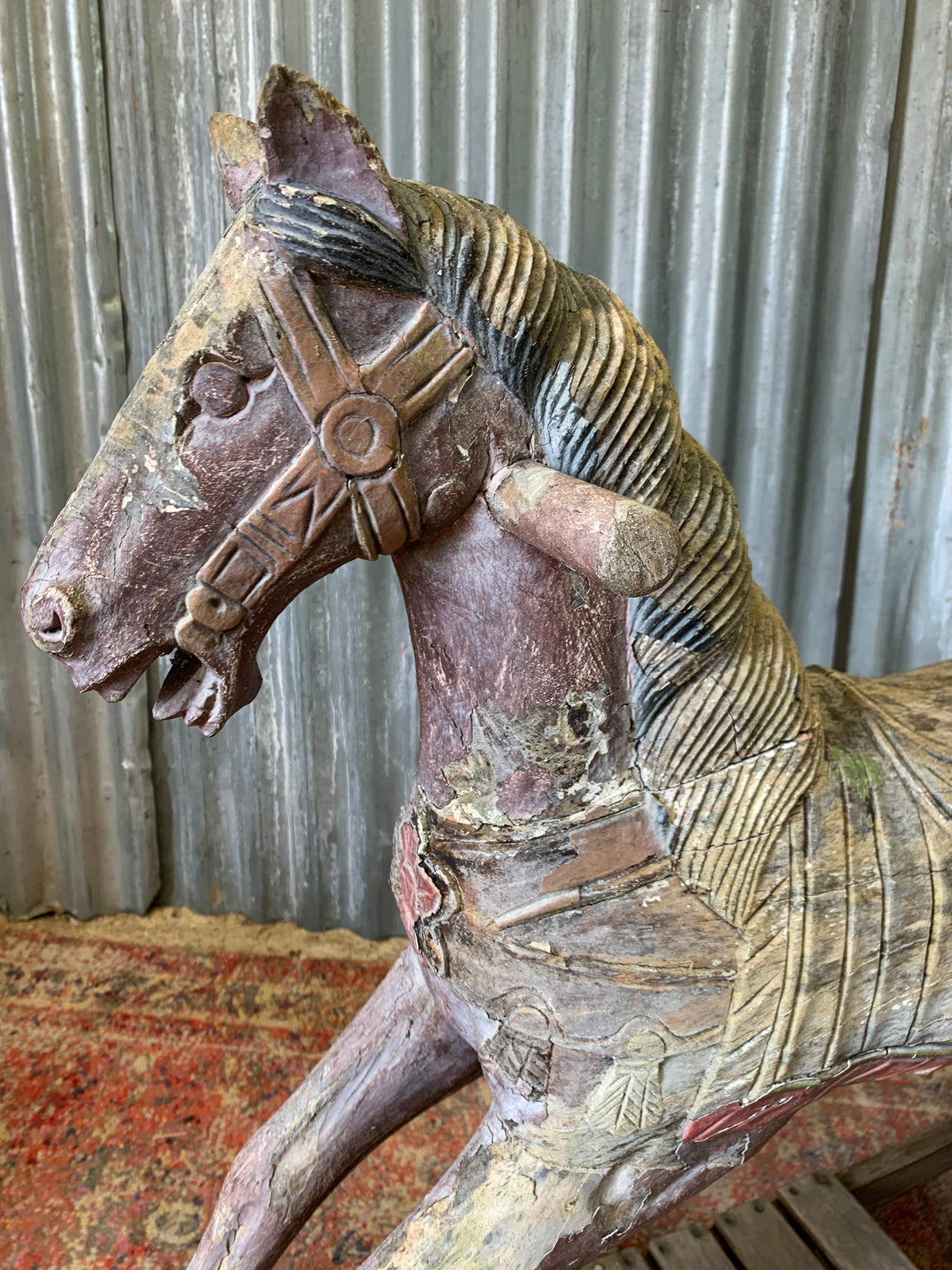 Carved wooden rocking horse