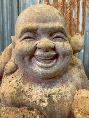 A large terracotta buddha statue