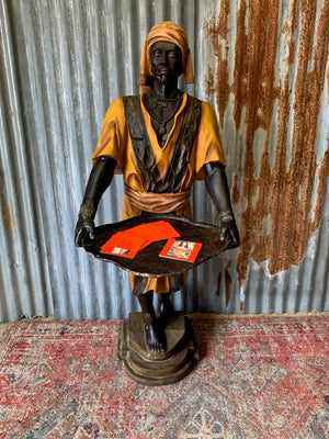 A full size Blackamoor figure with tray