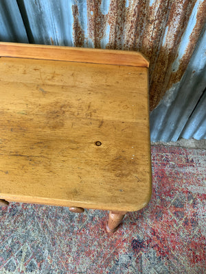A pine two-drawer desk