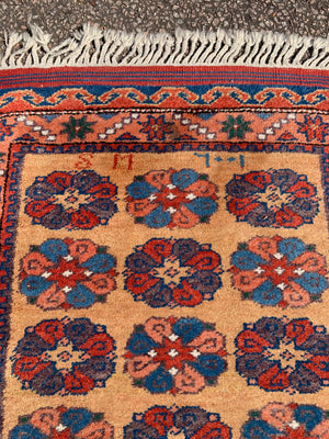 A long yellow ground red blue Persian runner rug ~ 257cm x 67cm