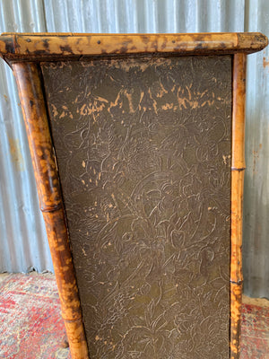 A tiger bamboo display cabinet