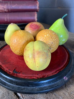 A set of six hand-painted alabaster fruits