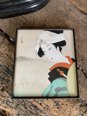 A Japanese ukiyo-e framed painting of a geisha