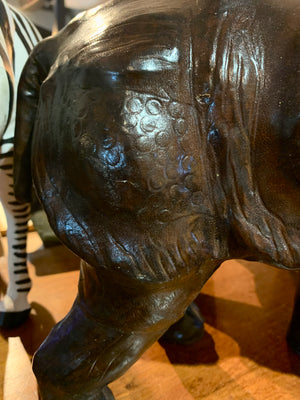 A large brown leather rhino
