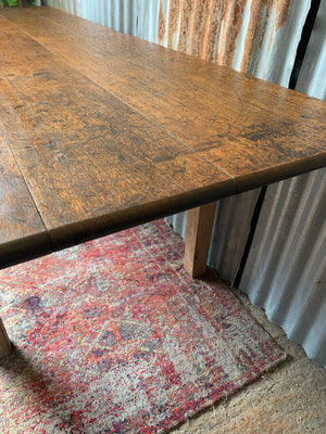 A very large 4 plank table