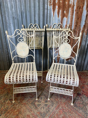 A lattice design garden table and chairs set