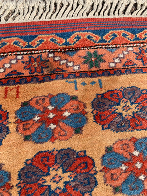 A long yellow ground red blue Persian runner rug ~ 257cm x 67cm