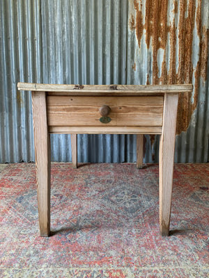 A pine kitchen table by Staines of Westminster