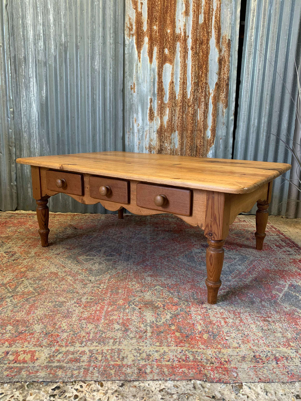 A large pine coffee table