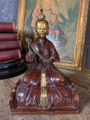 A Taoist seated figure of Lingbao Tianzun with a Ruyi sceptre
