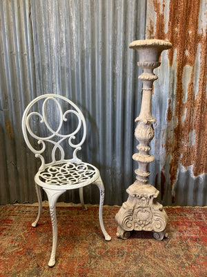 A large stone effect pricket candlestick