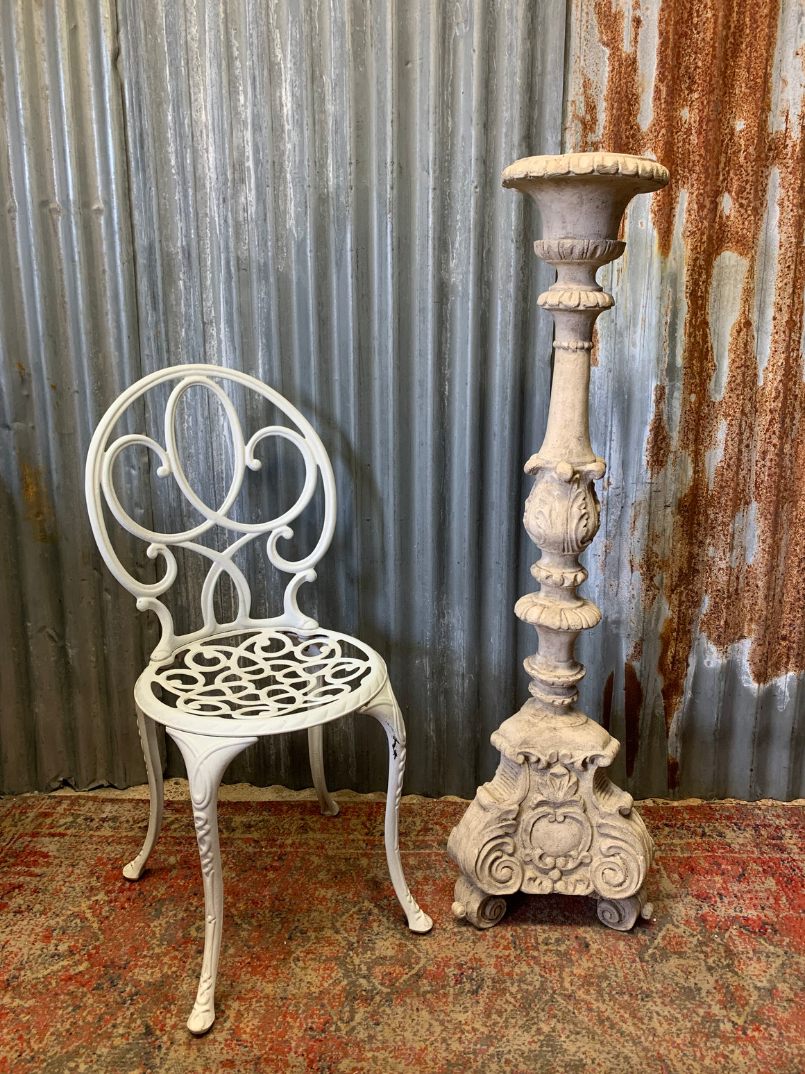 A large stone effect pricket candlestick
