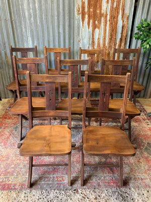 An Edwardian oak folding chapel chair by Mealing Bros