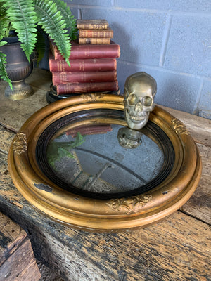 A large Regency giltwood convex mirror