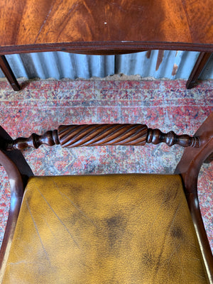 A serpentine desk and leather chair by Bevan Funnell