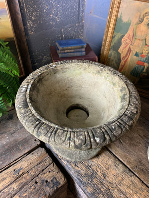 A pair of large cast stone gadrooned urns