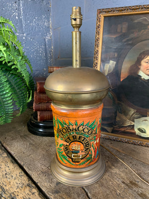 A converted tobacco jar lamp