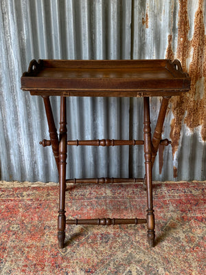 An oak butler's tray table