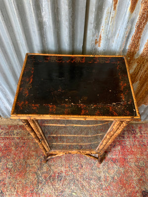 A tiger bamboo display cabinet