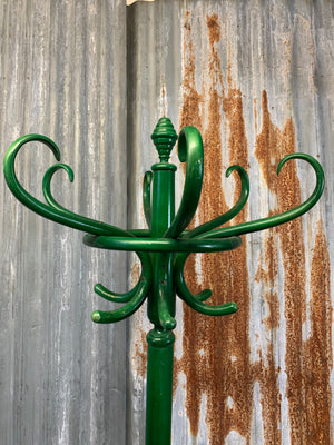 A tall bentwood coat stand with hat rack